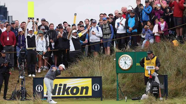 Brian Harman plays his tee shot on the 14th hole during the third day of the 2023 British Open.